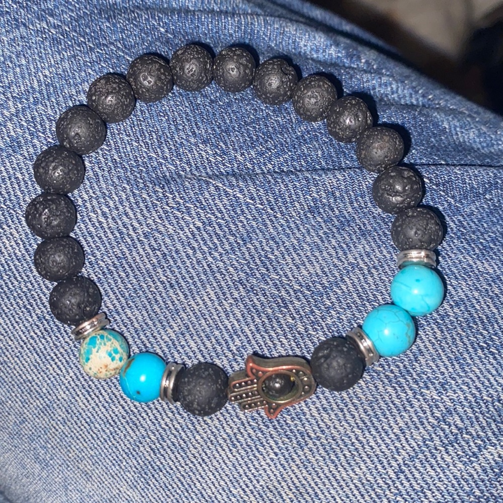 Lava bracelet can add essential sent oil on this unisex bracelet